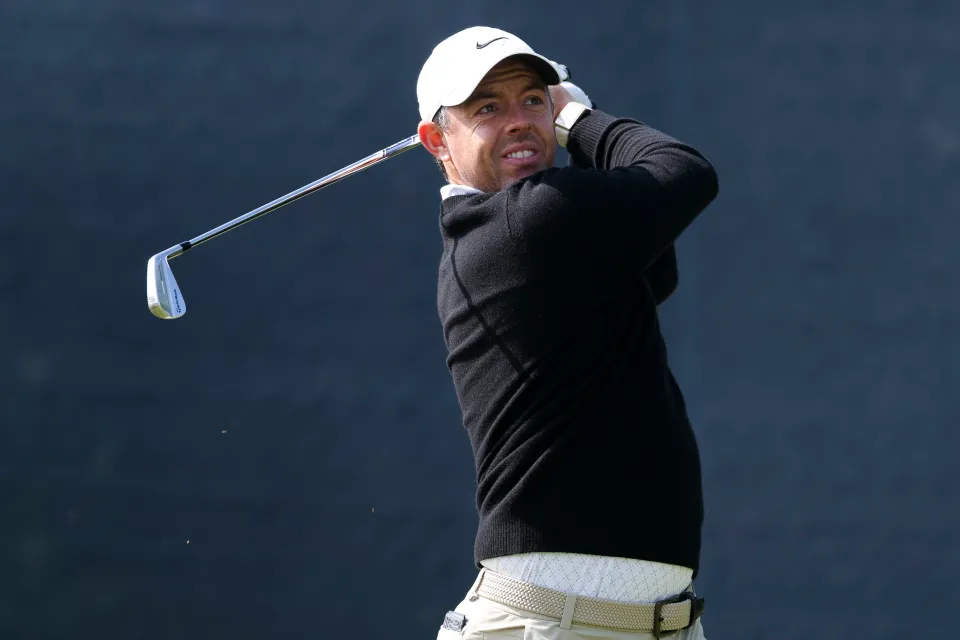 Rory McIlroy of Northern Ireland plays his shot from the 14th tee during the first round of the PGA Championship