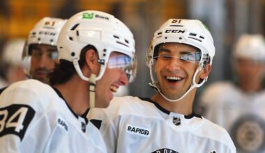 The Boston Bruins held their development camp at Warrior Ice Arena. Frederic Brunet(left) and Matt Poitras share a light moment.