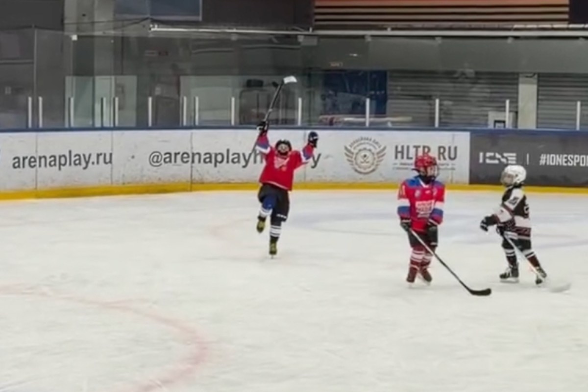 Alex Ovechkin smiles proudly after Ovi Jr goes coast-to-coast to score goal and celebrates during youth hockey game