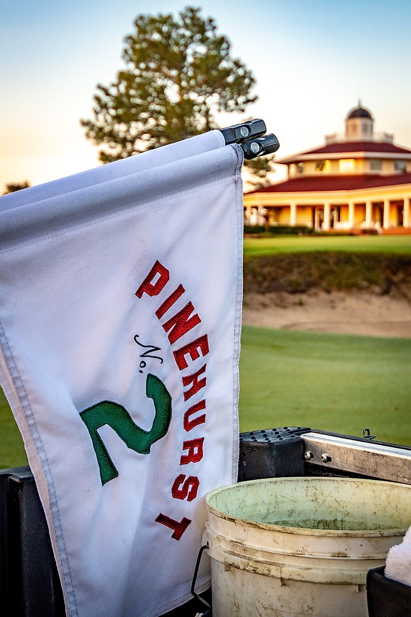 Pinehurst No. 2 pin flag is readied to be placed on the 18th hole.