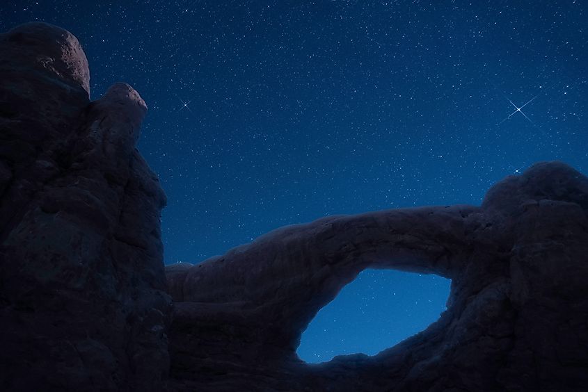 The Certified international Dark Sky State of Utah creates the backdrop for star filled sky over this natural bridge