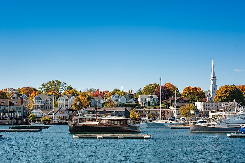 View of waterfront buildings along the coast in Camden, Maine.
