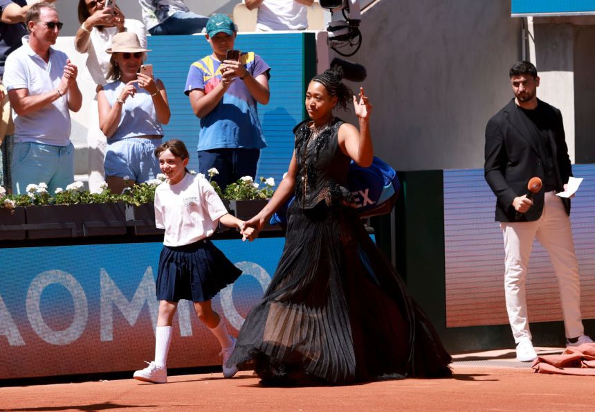 Osaka enters the court wearing her <a href=