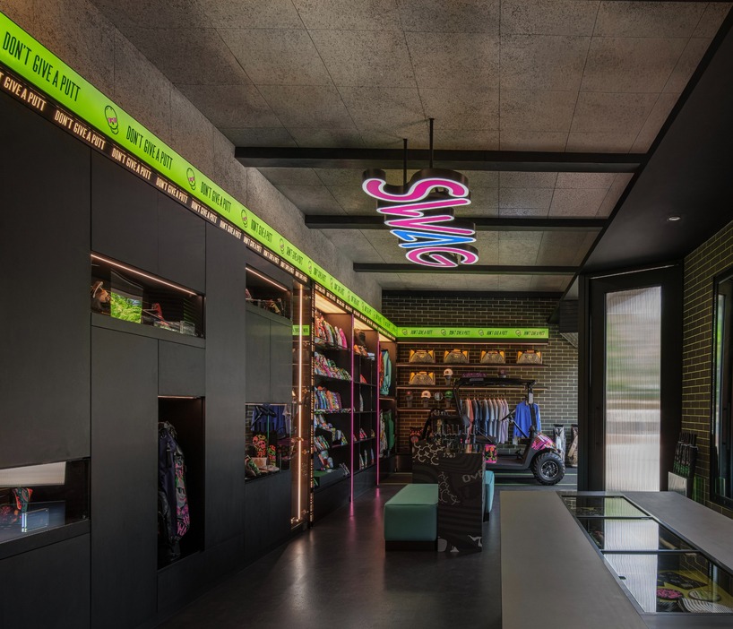 monochrome surfaces and neon accents outline swag golf bangkok flagship - 4