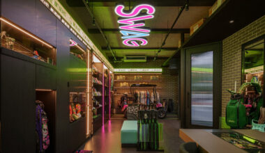 monochrome surfaces and neon accents outline swag golf’s bangkok flagship