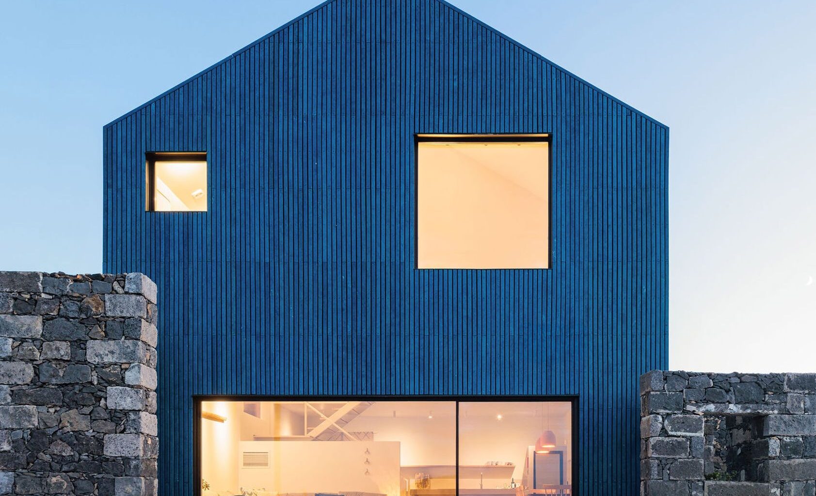 Atelier Backlar wraps clifftop house in recycled ocean plastic