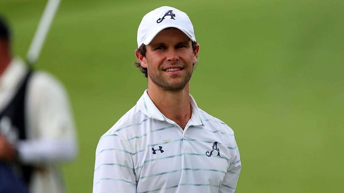 Thomas Detry acknowledges fans at the 18th green during LIV Golf Singapore.