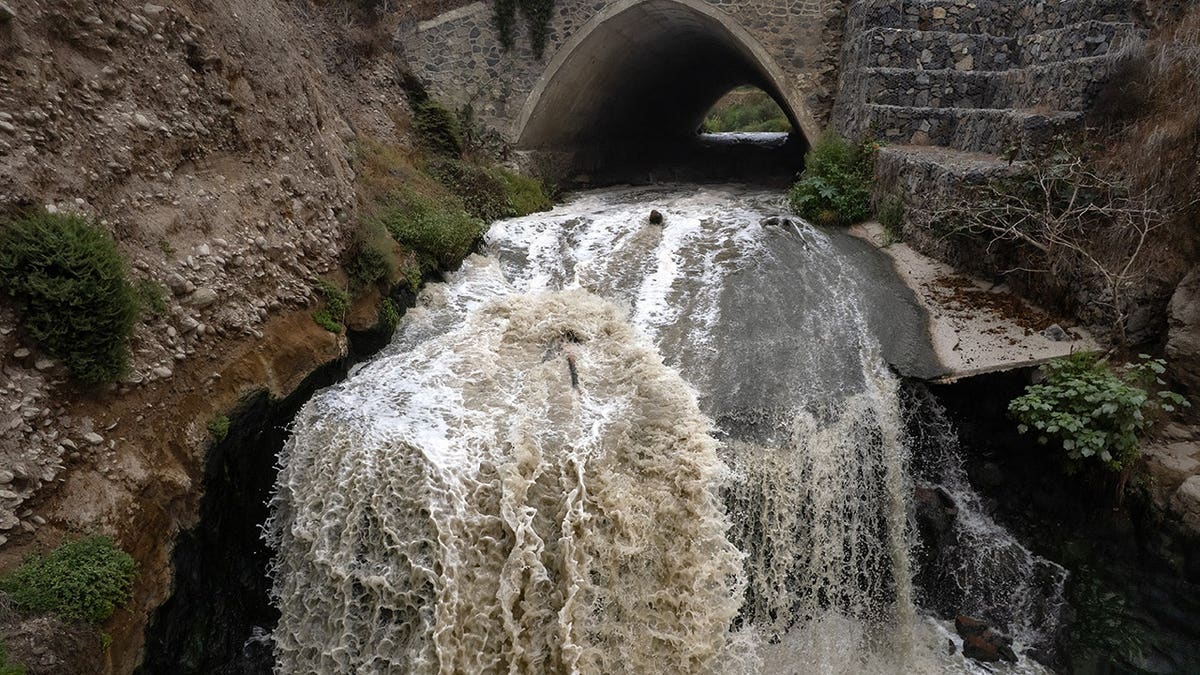 Aerial view of treated wastewater flowing in Tijuana River near Real Del Mar