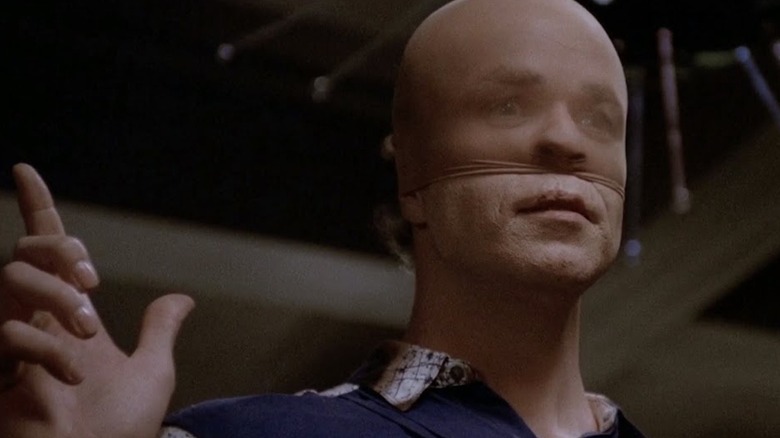 Tom Noonan wears pantyhose over his head as Francis Dolarhyde in Manhunter
