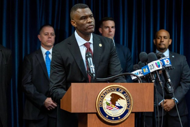 United States Attorney Markenzy Lapointe speaks to the media about a network of nursing school operators who allowed students to buy diplomas without the proper training during a January 2023 press conference at the U.S. Attorney's Office for the Southern District of Florida in Miami. (D.A. Varela/Miami Herald/TNS)