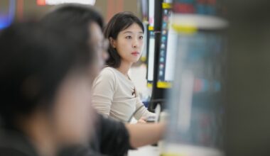 Asian shares mostly gain and oil slips