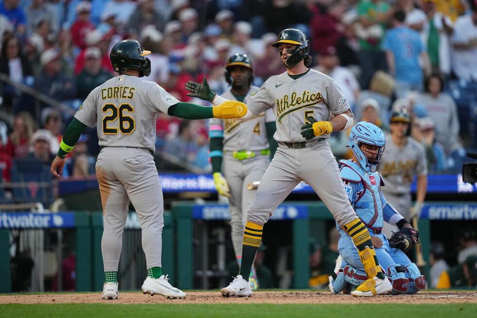 Ginn goes 8 innings and Gelof hits one of four A's homers in 12-1 rout of Phillies