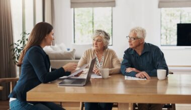 Retirees are speaking with a financial advisor.