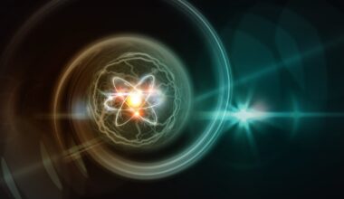 An artistic rendering shows an atomic structure against a dark background.