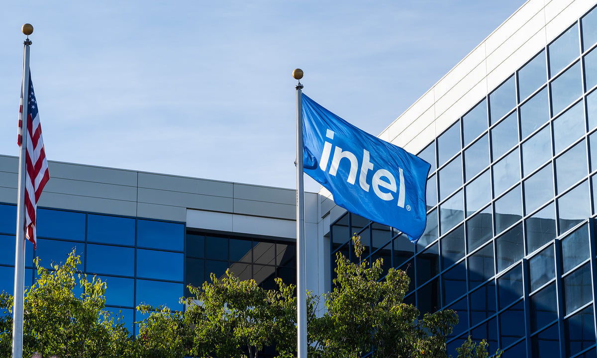 Intel flag waving in front of company headquarters.