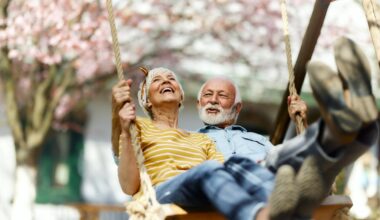 Retired couple on a tree swing.