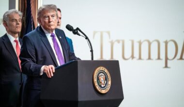 President Trump is shown at a podium.