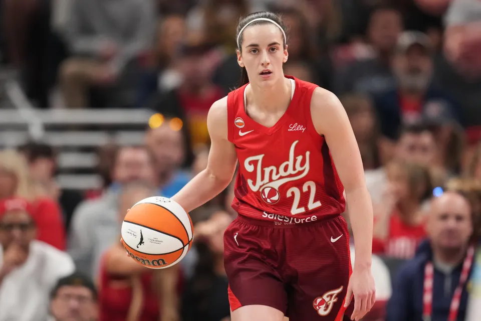 Caitlin Clark #22 of the Indiana Fever dribbles the ball during the game against the Dallas Wings on May 9, 2026