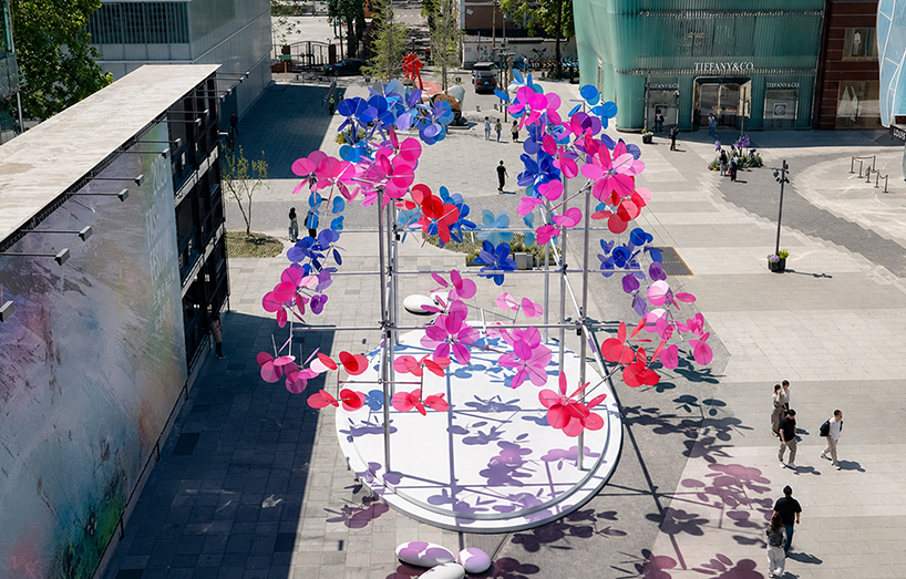 kinetic translucent discs form vincent leroy’s chromatic cloud installation in beijing - 1