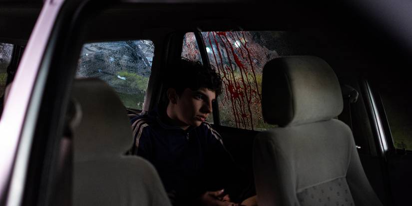 Emilio Vodanovich sitting in a car in Demián Rugna’s When Evil Lurks.