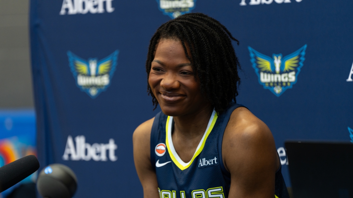 Dulcy Fankam Mendjiadeu posing in her Dallas Wings jersey during 2026 Media Day.
