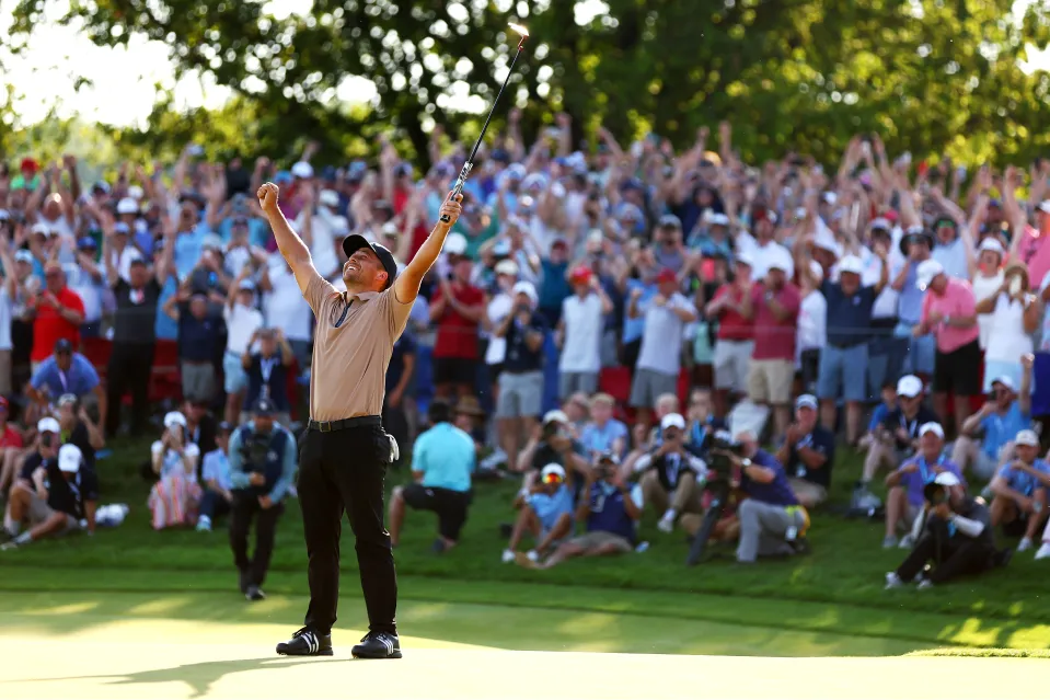 Xander Schauffele of the United States celebrates after winning on the 18th green during the final round of the 2024 PGA Championship