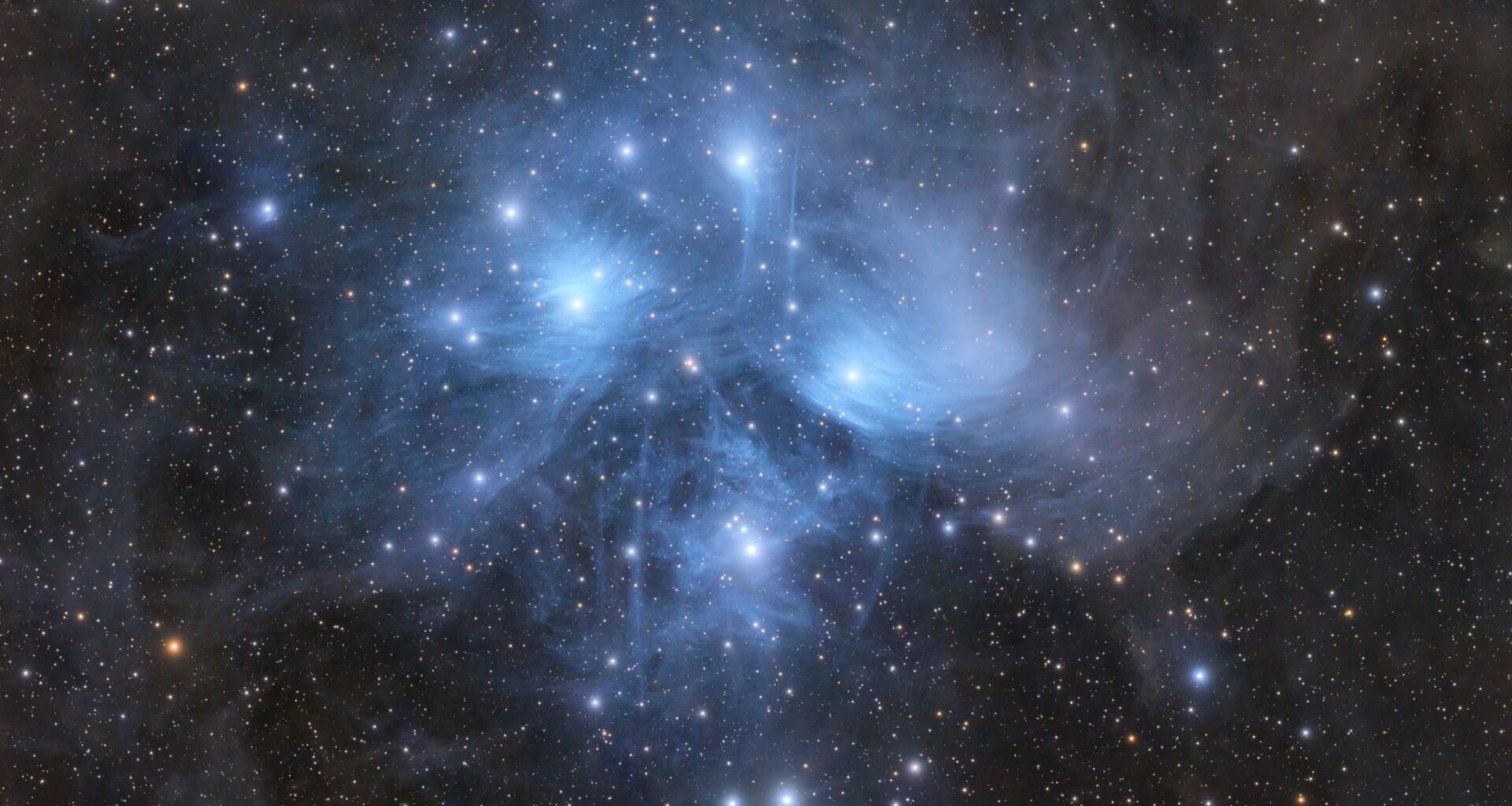 Astrophotographer captures Pleiades 'Seven Sisters' glowing through ghostly blue veil