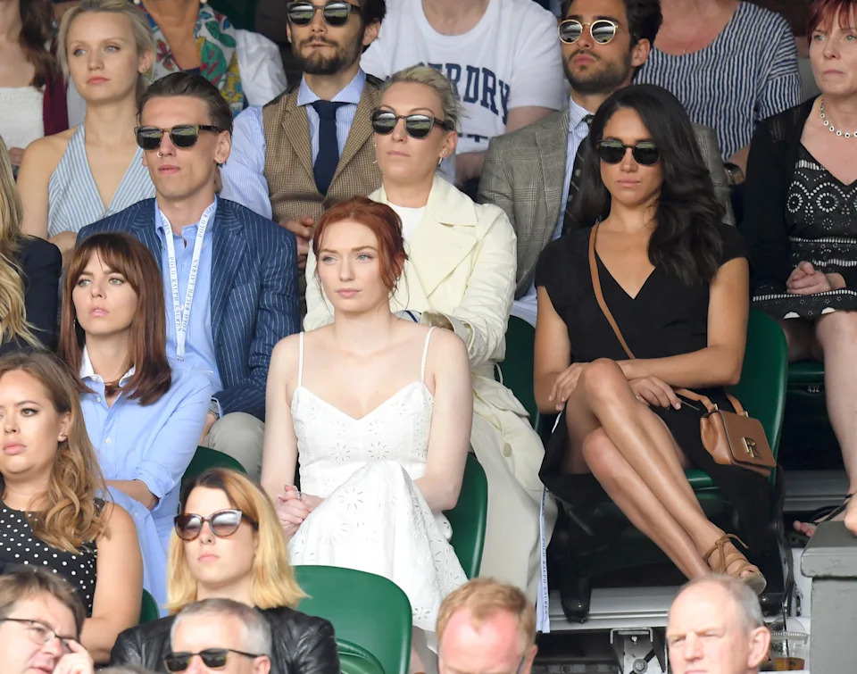 Meghan Markle, among seated spectators.