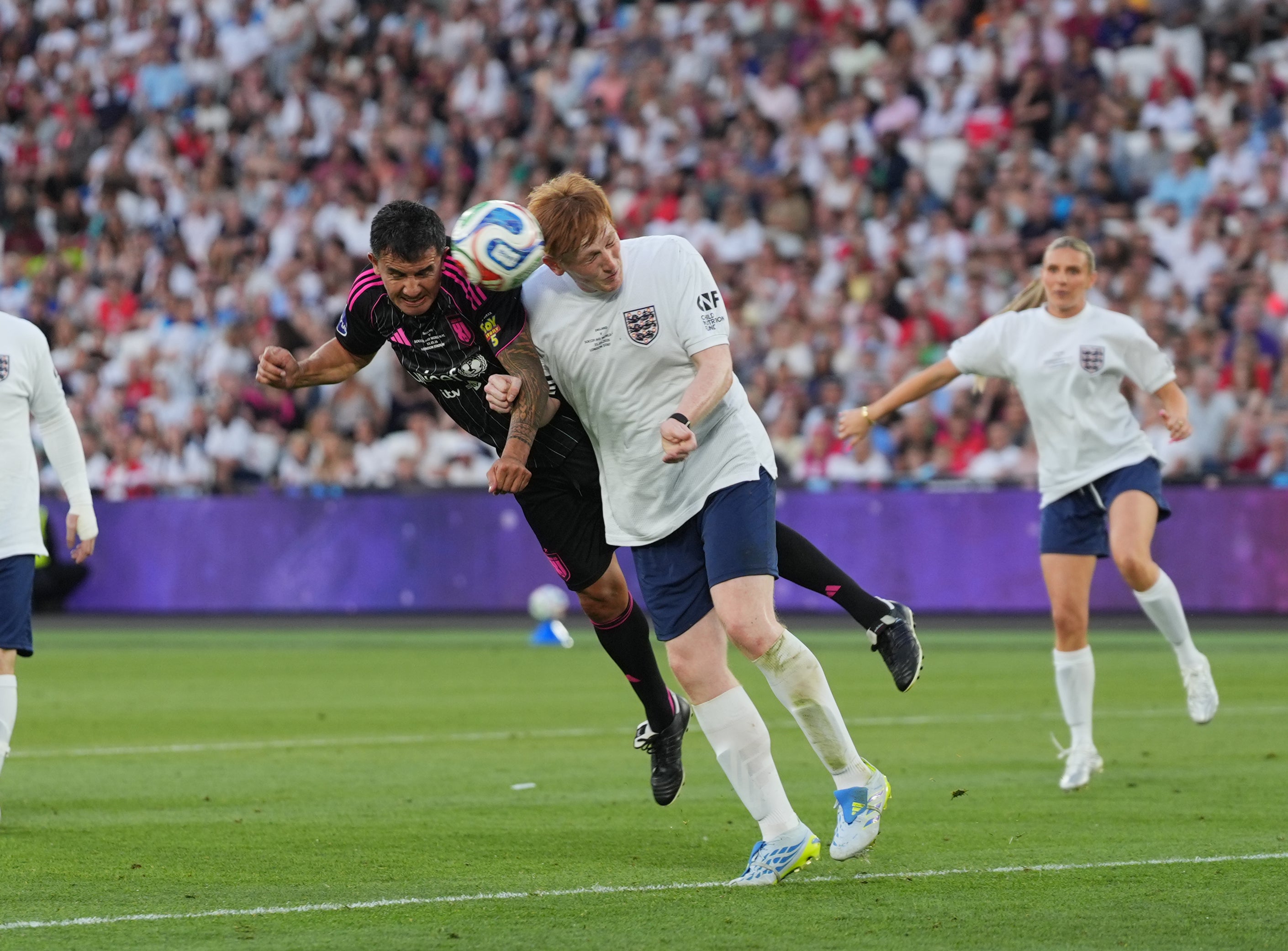 World XI's Tim Cahill scores their side's second goal of the game during Soccer Aid for UNICEF
