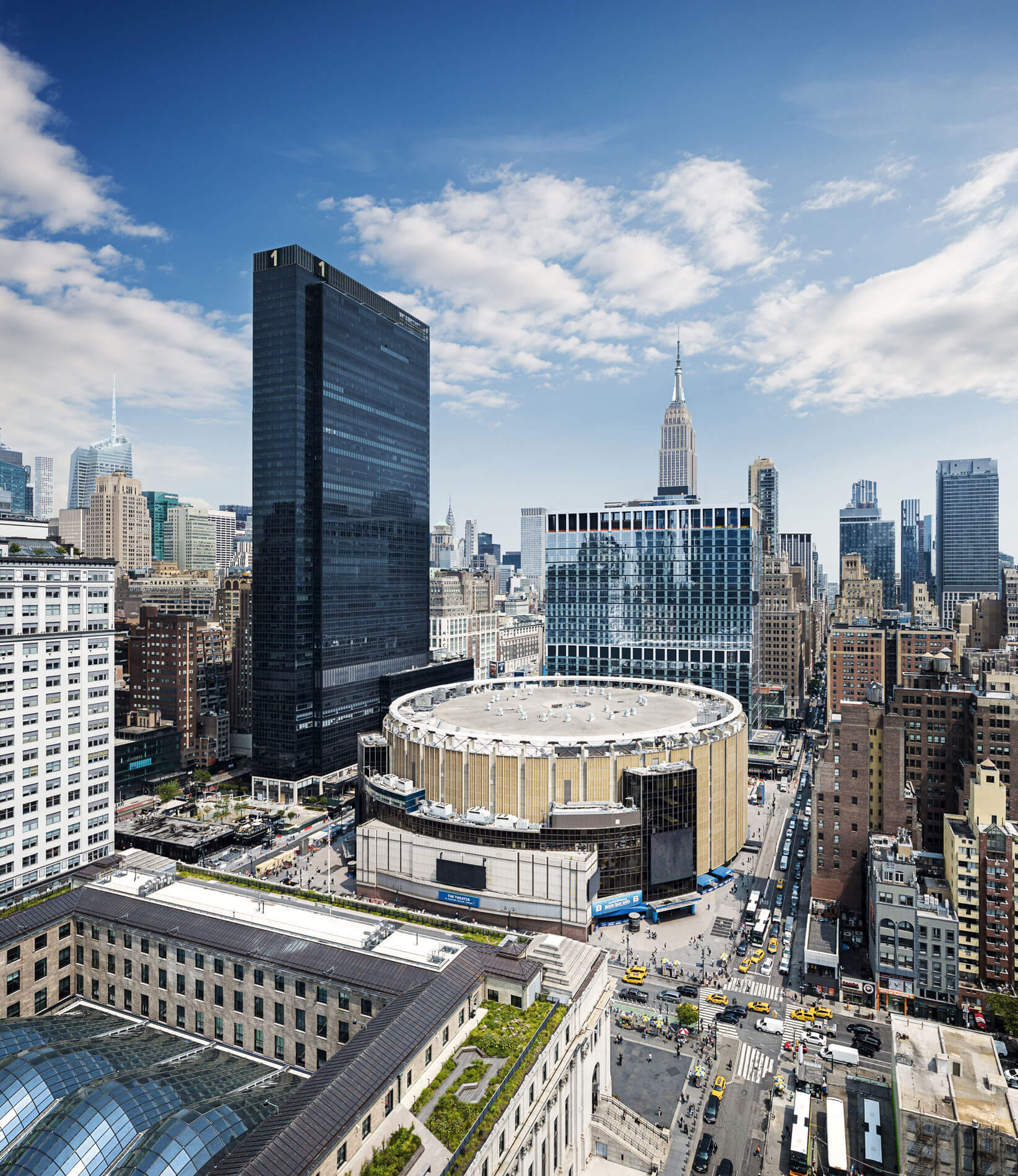 Before, an aerial view of Penn Station and surrounding streets 