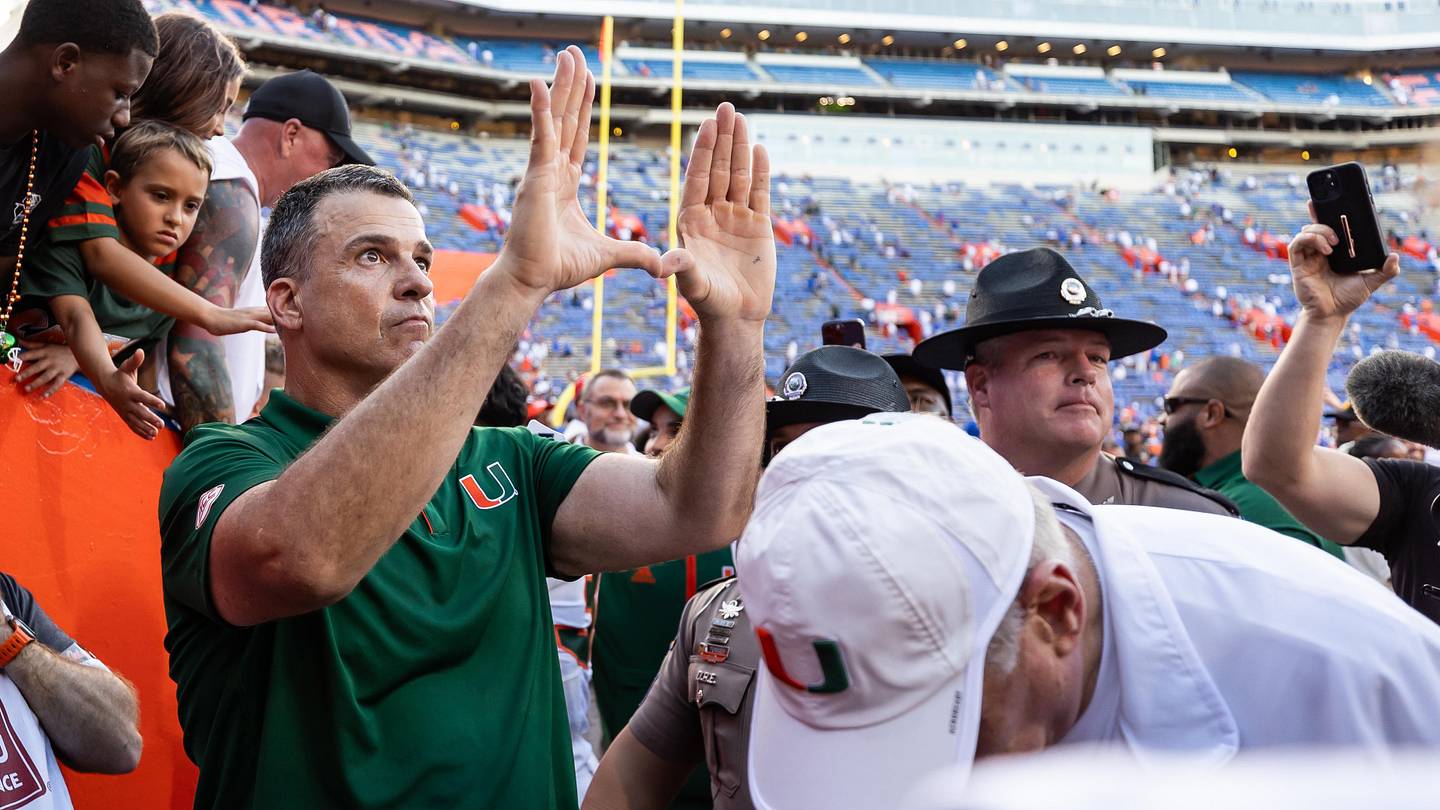 Aug 31, 2024; Gainesville, Florida, USA; Miami Hurricanes head coach Mario Cristobal gestures after a game against the Florida Gators at Ben Hill Griffin Stadium. Mandatory Credit: Matt Pendleton-Imagn Images