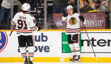 Jan 16, 2025; Nashville, Tennessee, USA;  Chicago Blackhawks center Connor Bedard (98) celebrates his goal with center Frank Nazar (91) against the Nashville Predators during the second period at Bridgestone Arena. Mandatory Credit: Steve Roberts-Imagn Images