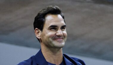 Roger Federer watches Aryna Sabalenka and smiles