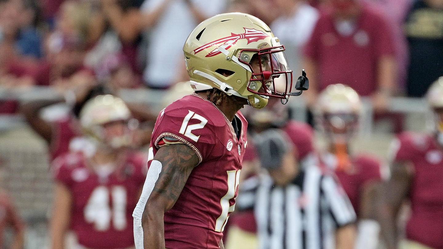 Oct 7, 2023; Tallahassee, Florida, USA; Florida State Seminoles defensive back Conrad Hussey (12) celebrates after a tackle against Virginia Tech Hokies running back Bhayshul Tuten (not pictured) during the second half against the at Doak S. Campbell Stadium. Mandatory Credit: Melina Myers-Imagn Images