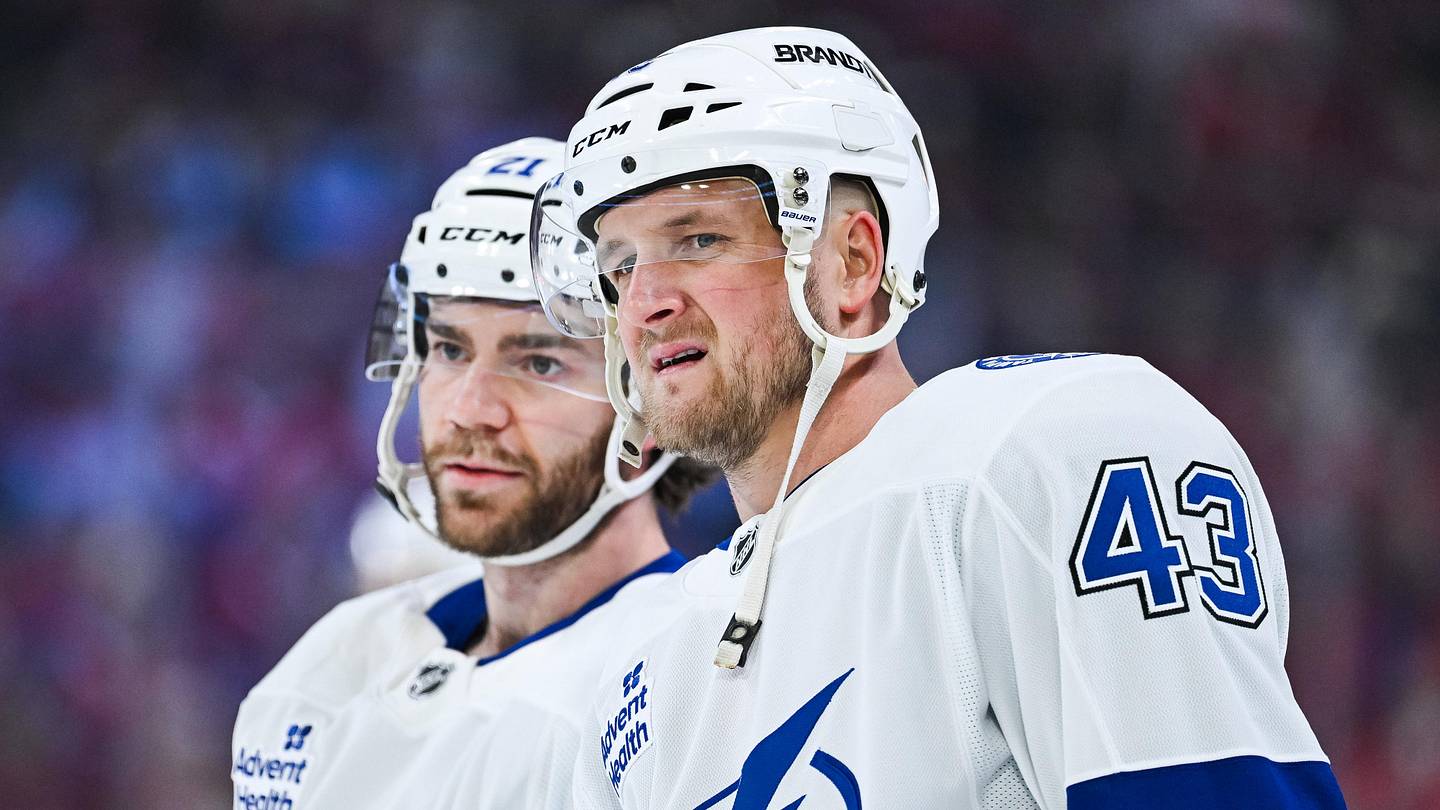 Apr 26, 2026; Montreal, Quebec, CAN; Tampa Bay Lightning defenseman Darren Raddysh (43) looks on beside center Brayden Point (21) during warm-up before the game against the Montreal Canadiens in game four of the first round of the 2026 Stanley Cup Playoffs at Bell Centre. Mandatory Credit: David Kirouac-Imagn Images