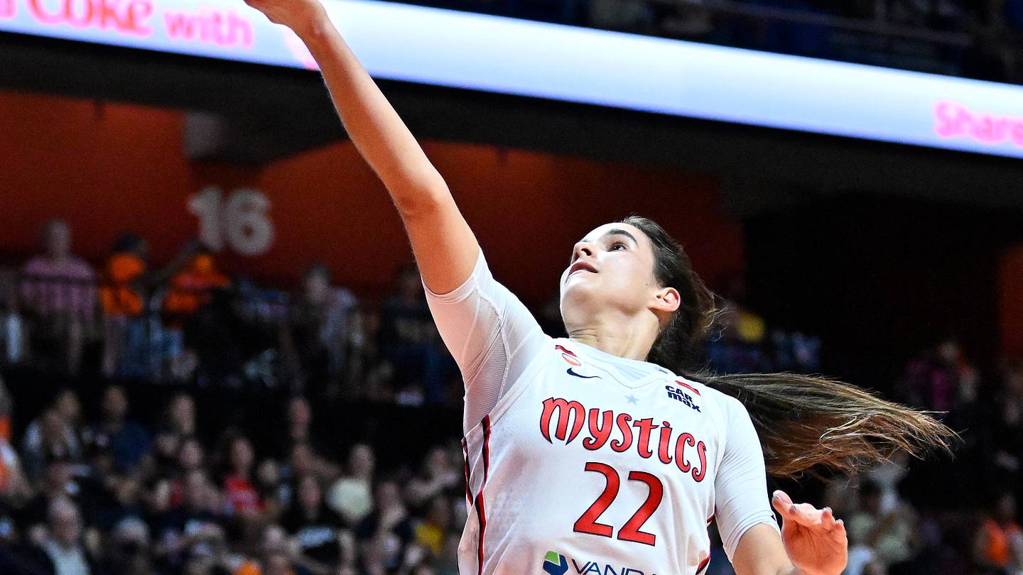 Jun 17, 2026; Uncasville, Connecticut, USA; Washington Mystics guard Sonia Citron (22) shoots a layup against the Connecticut Sun during the first half at Mohegan Sun Arena. Mandatory Credit: Eric Canha-Imagn Images