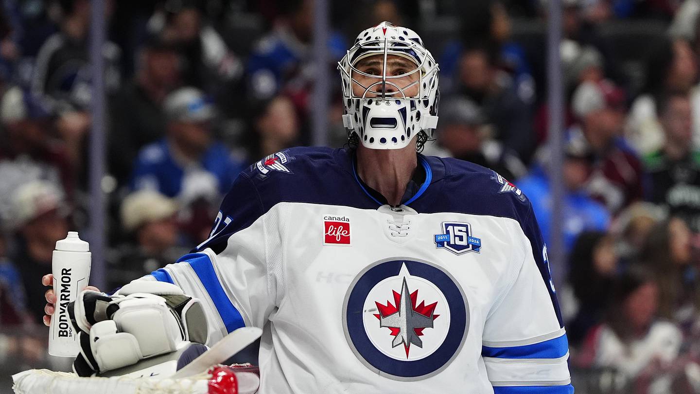 Mar 28, 2026; Denver, Colorado, USA; Winnipeg Jets goaltender Connor Hellebuyck (37) during the second period against the Colorado Avalanche at Ball Arena. Mandatory Credit: Ron Chenoy-Imagn Images
