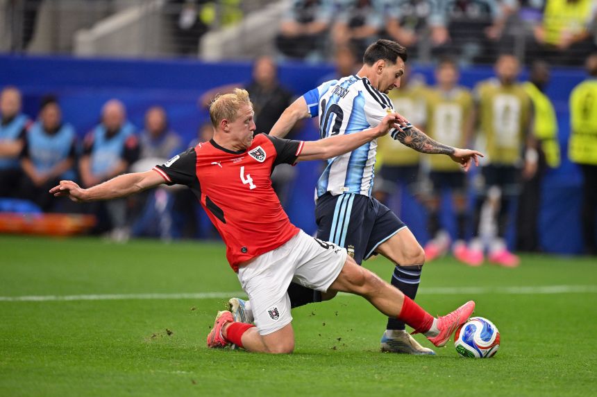 Austria midfielder Xaver Schlager and Argentina forward Lionel Messi in action during a World Cup match last week.