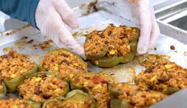 Volunteers prepare stuffed peppers at Community Servings in Jamaica Plain, on Jun. 1.
