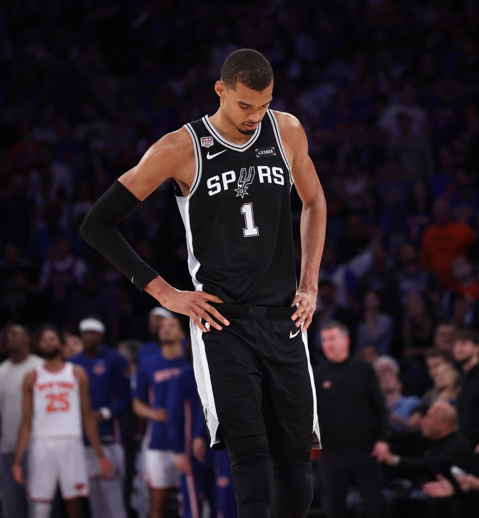 San Antonio Spurs forward Victor Wembanyama #1 reacts on the court during a foul shot in the fourth quarter. 