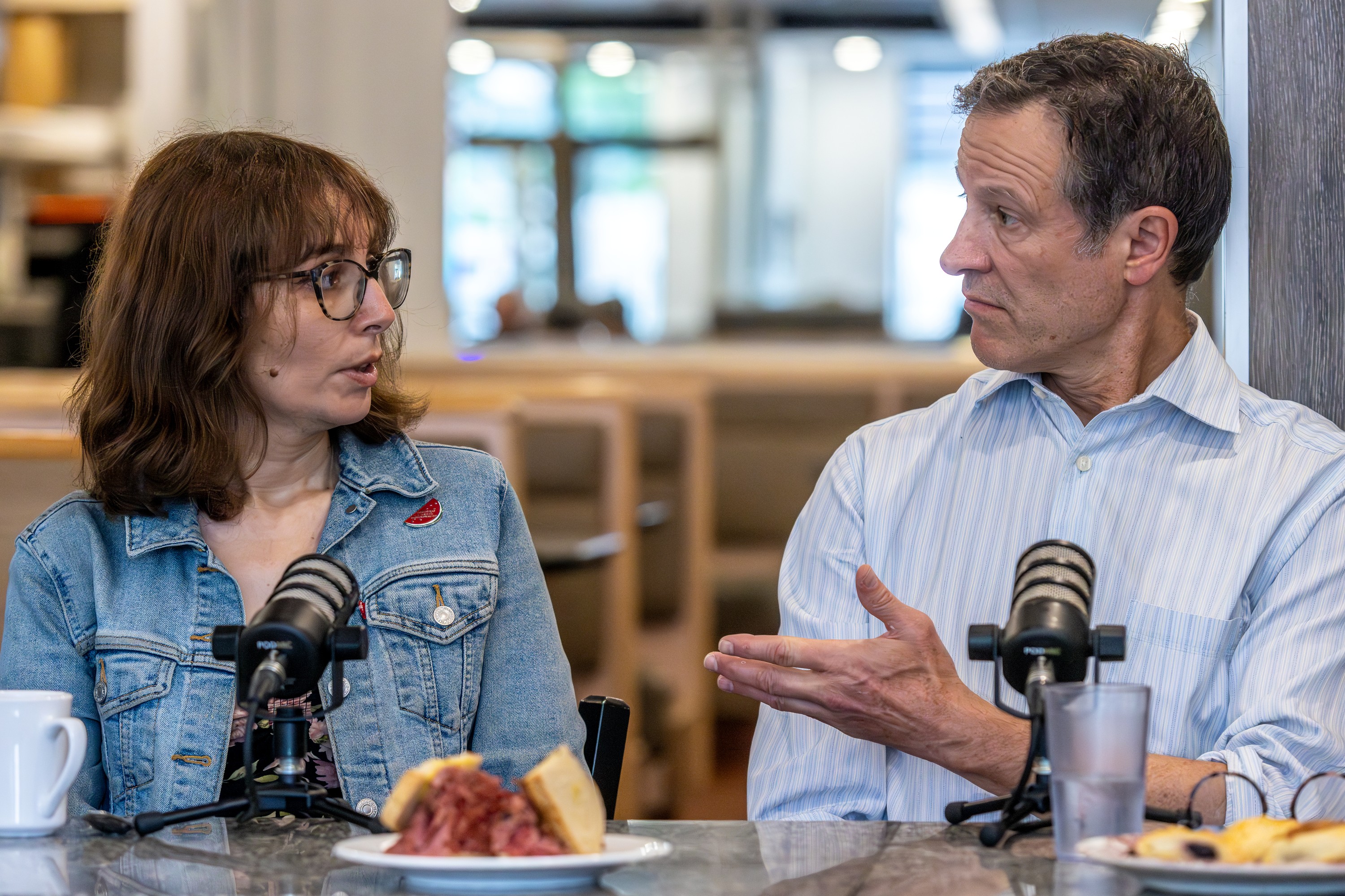 Aaron Rand and Bill Brownstein chat with Amy Darwish, housing advocate and James Hughes, President and CEO Old Brewery Mission on The Corner Booth at the Snowdon Deli in Montreal on Friday June 26, 2026. 