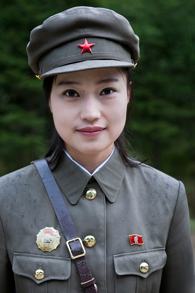 MT. BAEKTU, NORTH KOREA - SEPTEMBER 2011: A guide at Secret Camp No. 1 where North Korean history books claim Kim Jong Il was born in near Mt. Paektu AKA Mt. Baektu.