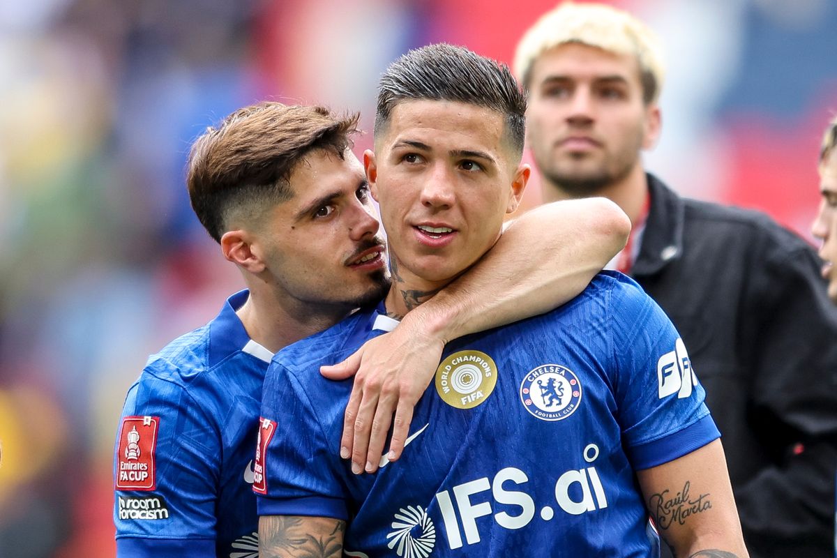 Enzo Fernandez and Pedro Neto celebrate after Chelsea's win over Leeds United