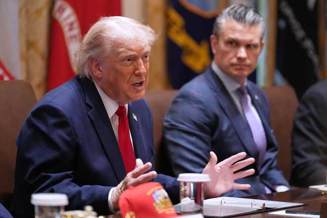 Trump, Hegseth President Donald Trump speaks during a Cabinet meeting at the White House, Wednesday, May 27, 2026, in Washington, as Secretary of Defense Pete Hegseth looks on.