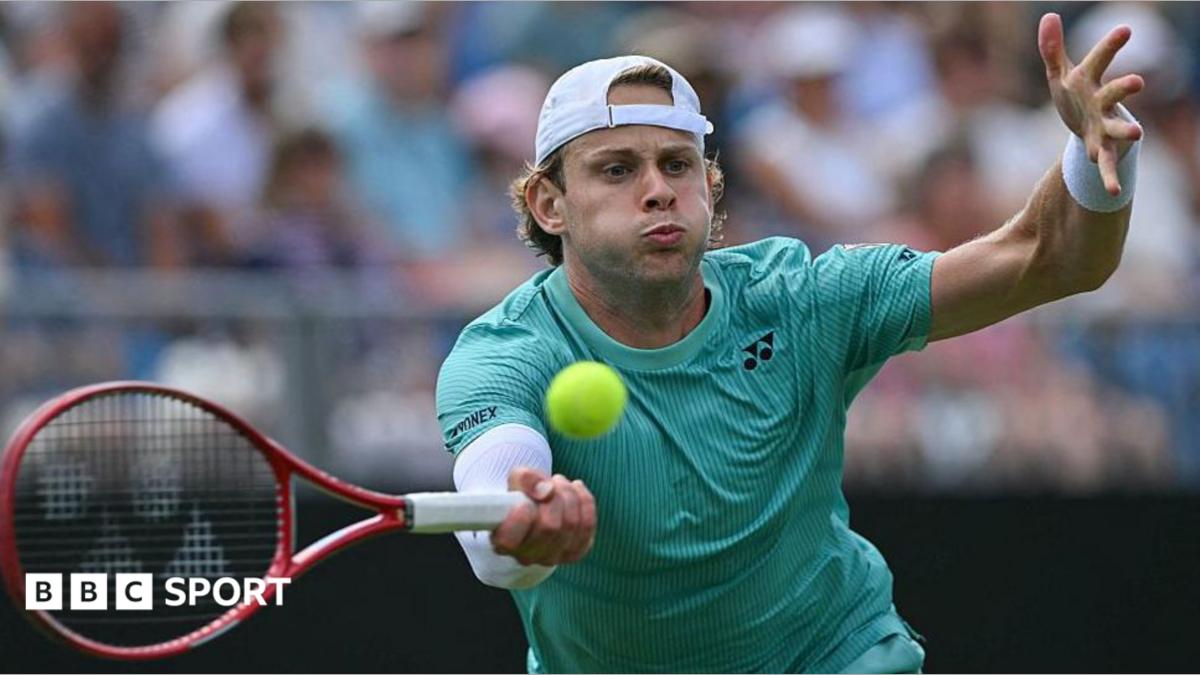 Zizou Bergs plays a forehand in the Eastbourne final