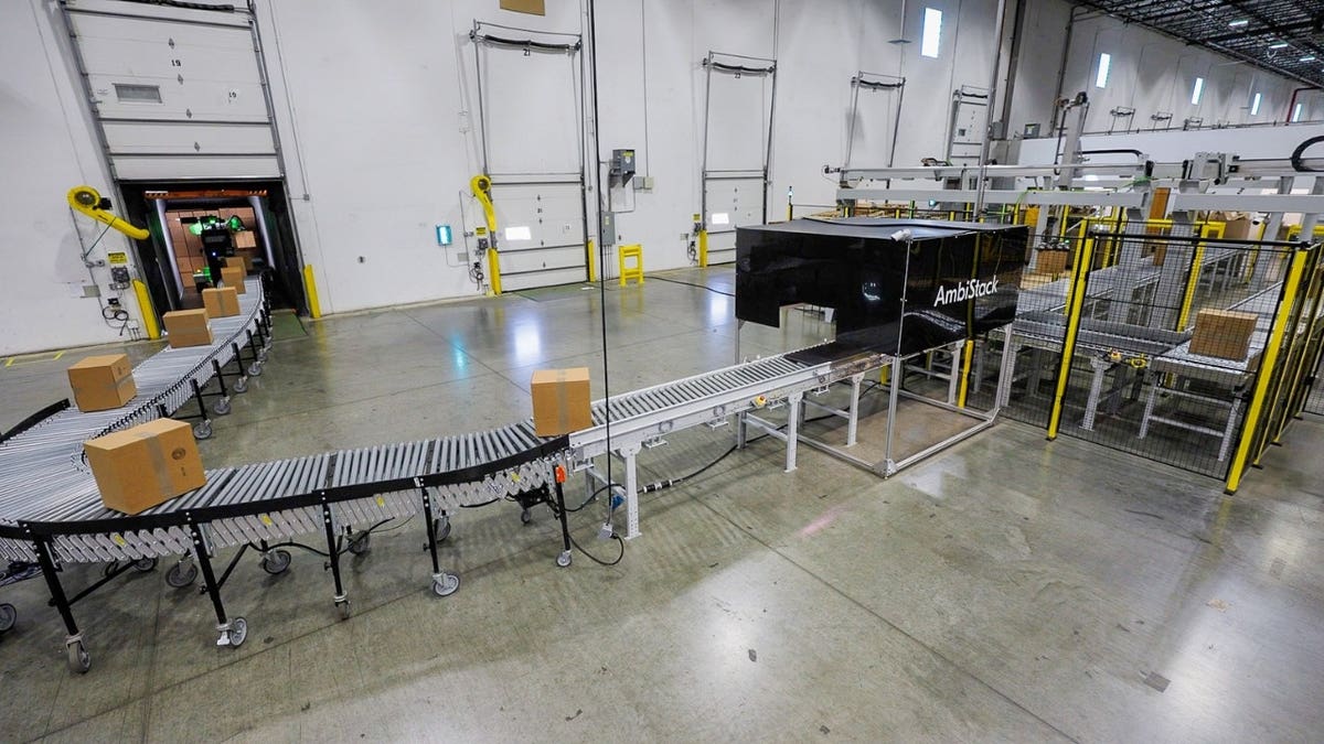 1 Warehouse robots move packages without human handoff