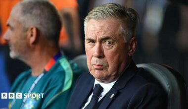 Brazil head coach Carlo Ancelotti sat in the dugout and looking to his left with a slight raised eyebrow before their World Cup match against Morocco