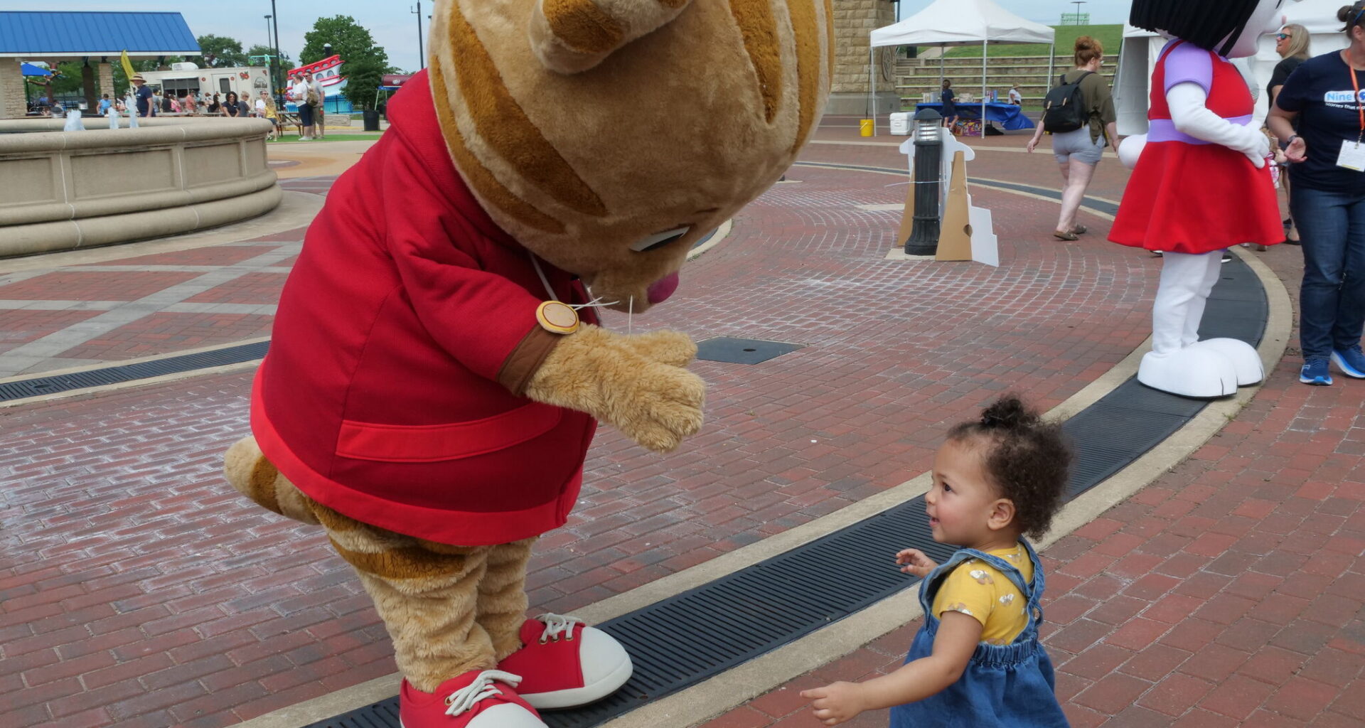 Sixteen-month-old Marleigh Goedelman from Swansea rushes toward a PBS-TV character during Mississippi Mornings, hosted by Nine PBS, on Saturday, May 30, 2026. 