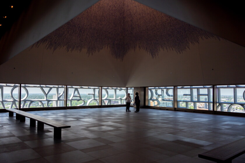 The Nelson Mandela Sky Room is on the top floor of the Museum Tower, with words from Obama's 2015 speech "You Are America" wrapping the south and west upper portions of the building.