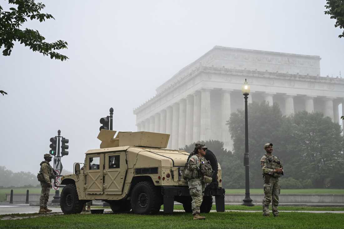 National Guard members stand watch near the Lincoln Memorial on the morning of Memorial Day in Washington, DC, May 25, 2026.
